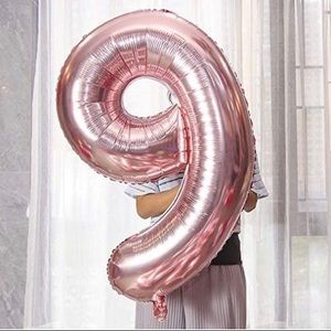 Used 34in Rose Gold Number Balloon from Party City